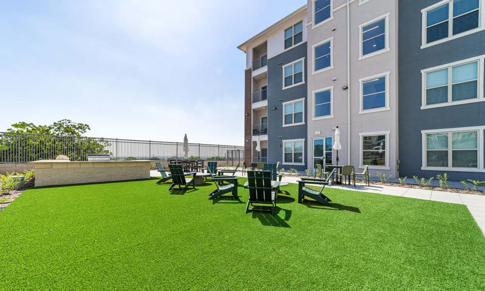 Community seating area on the outside of property at Main and Mill in Lewisville,Texas