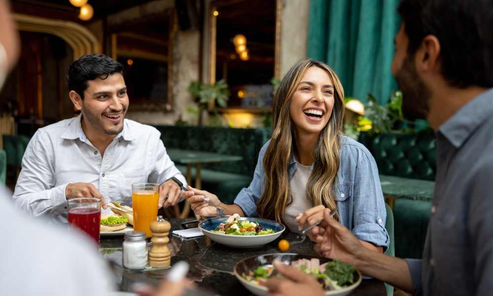 Resident enjoying some wine and fine dining at restaurant near Charthouse at James Island in Charleston, South Carolina