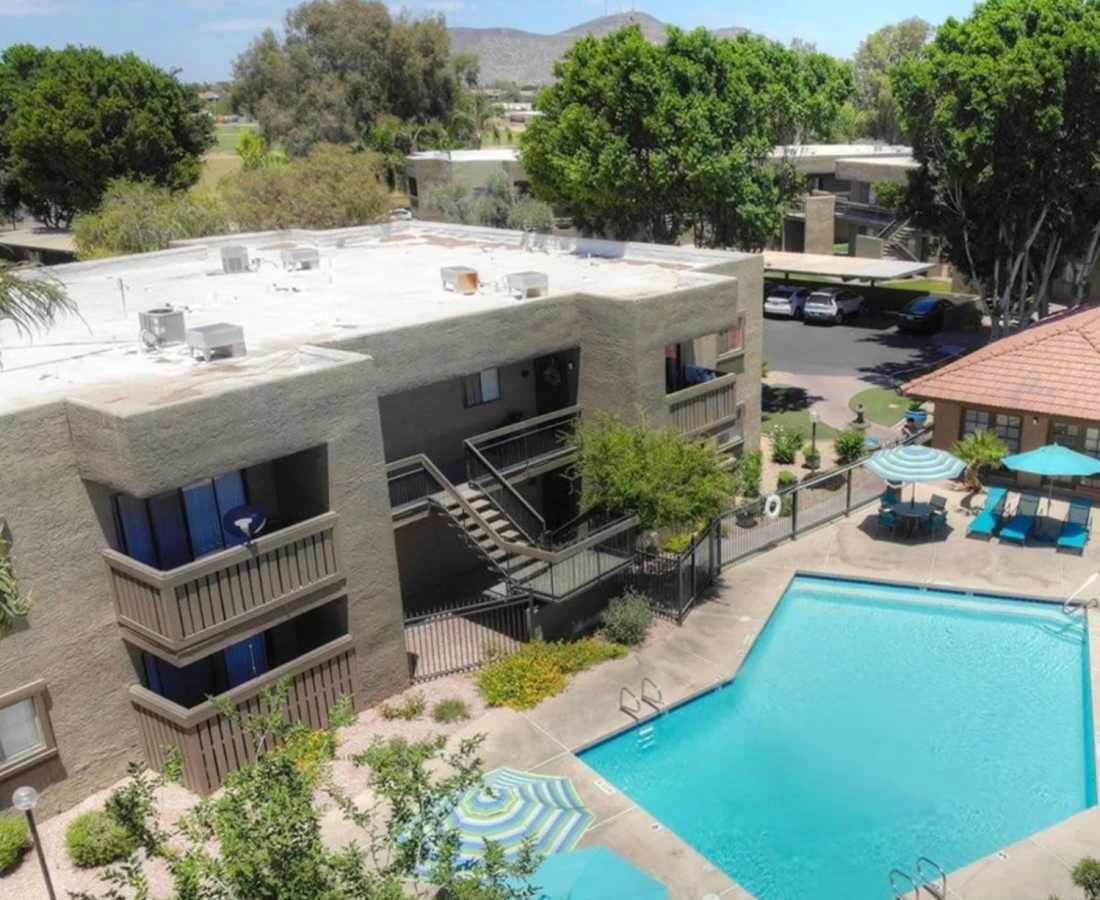 Shot of the building with its swimming pool at Raystone Apartments in Phoenix, Arizona