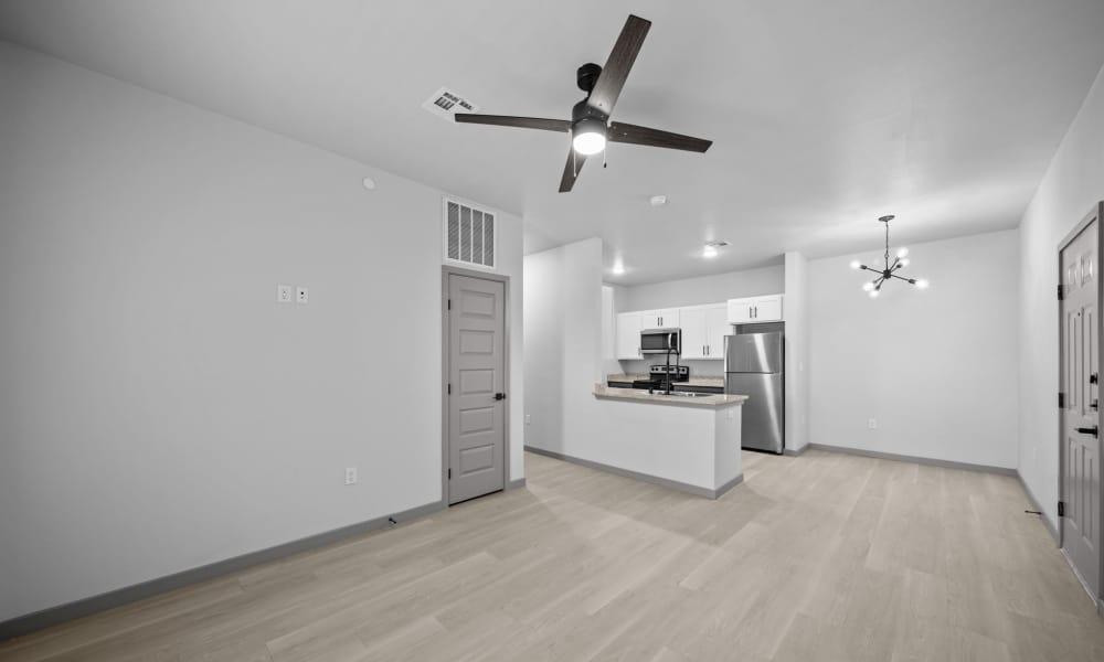 Open kitchen with wood flooring at Retreat at Eastlake in El Paso, Texas