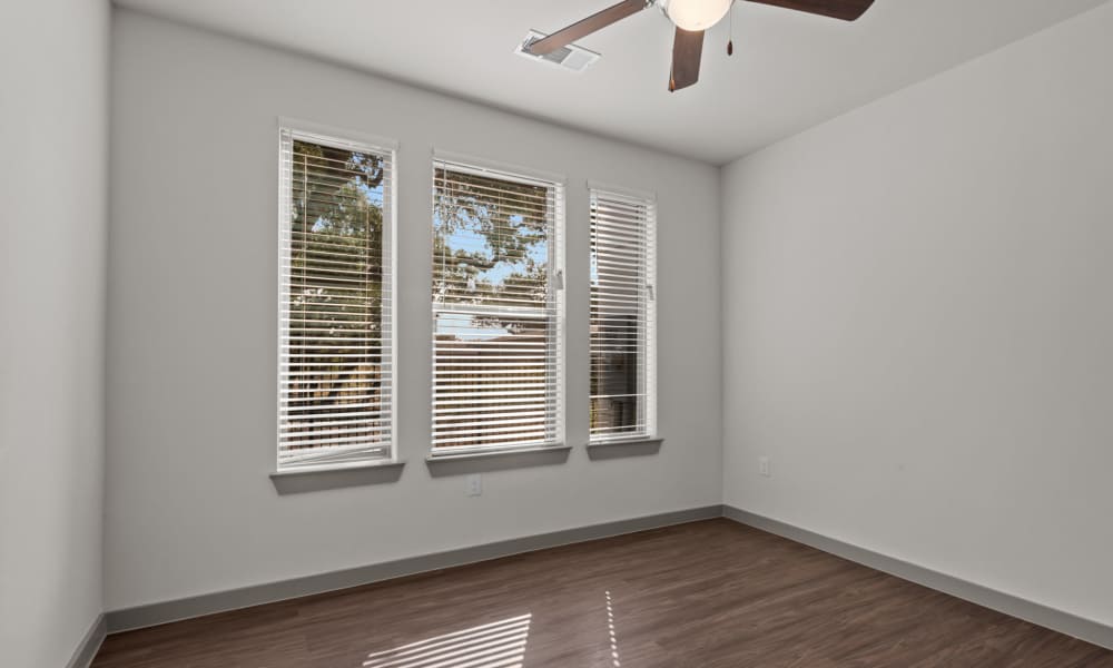 Bedroom with ceiling fan at Opal Point at Kyle in Kyle,Texas