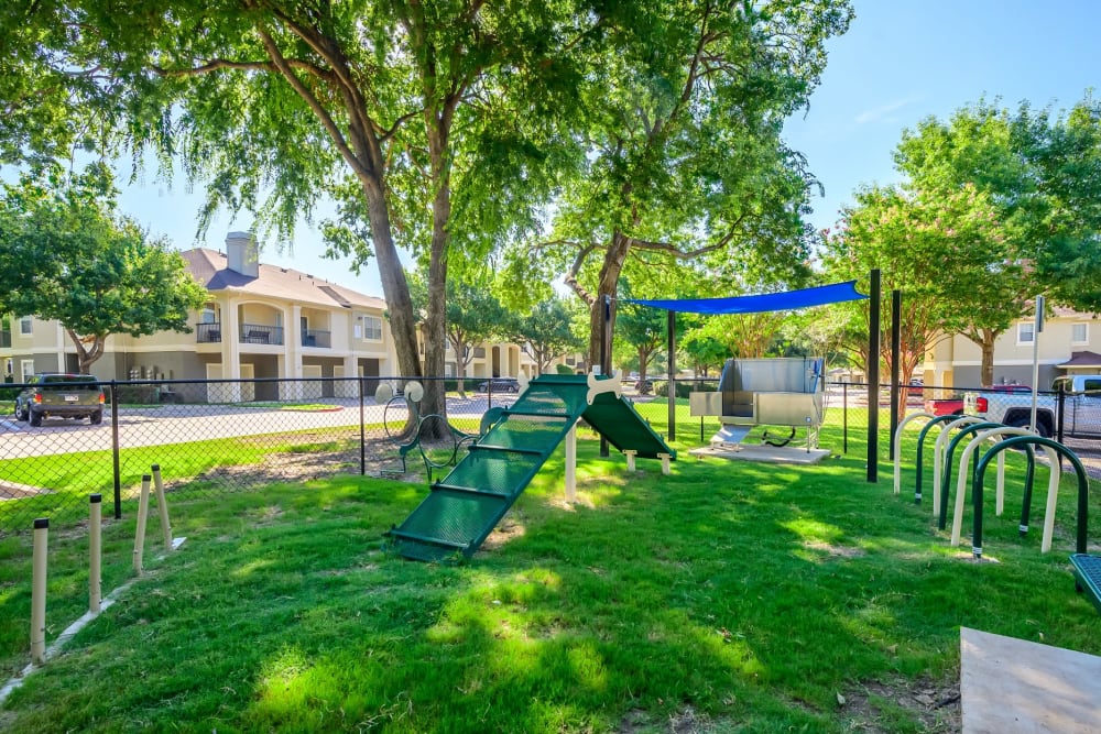 Bark park with an agility course onsite at 23Hundred @ Ridgeview in Plano, Texas