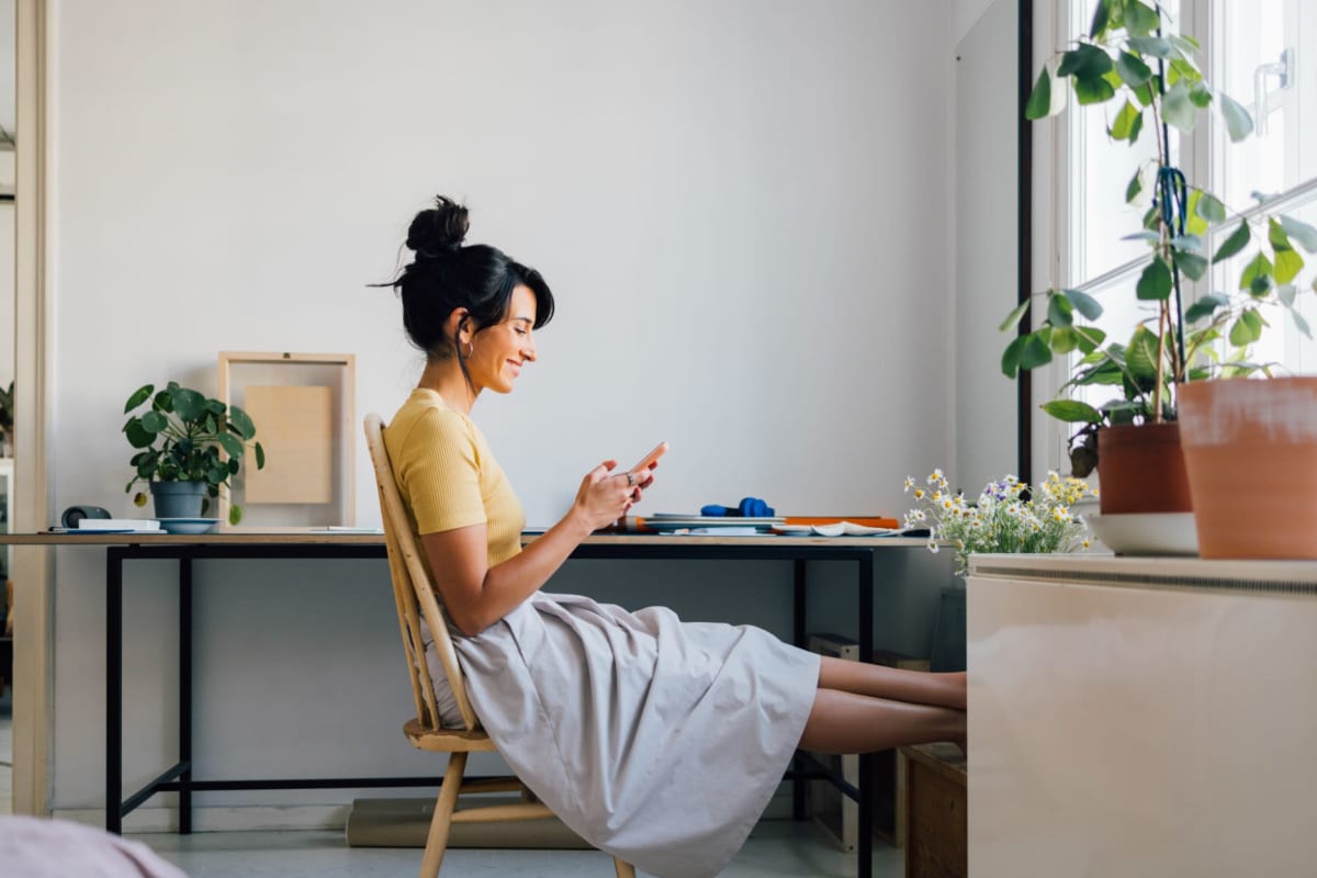 Resident at her desk at The Margot in Lawrenceville, Georgia