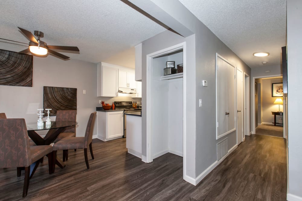 Dining room with wood-style flooring at Avery Park Apartments in Fairfield, California