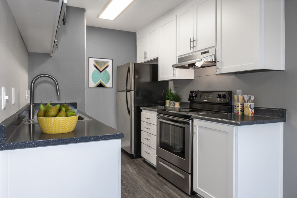 Kitchen with plenty of cabinet space at Avery Park Apartments in Fairfield, California