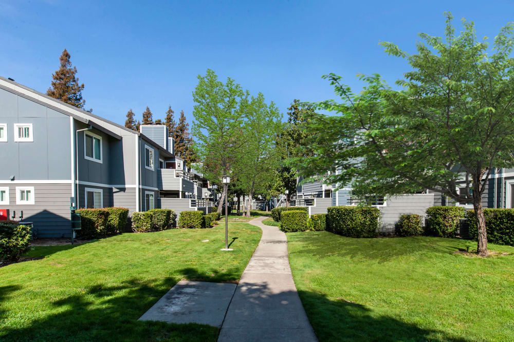 A walkway through the community at Bennington Apartments in Fairfield, California