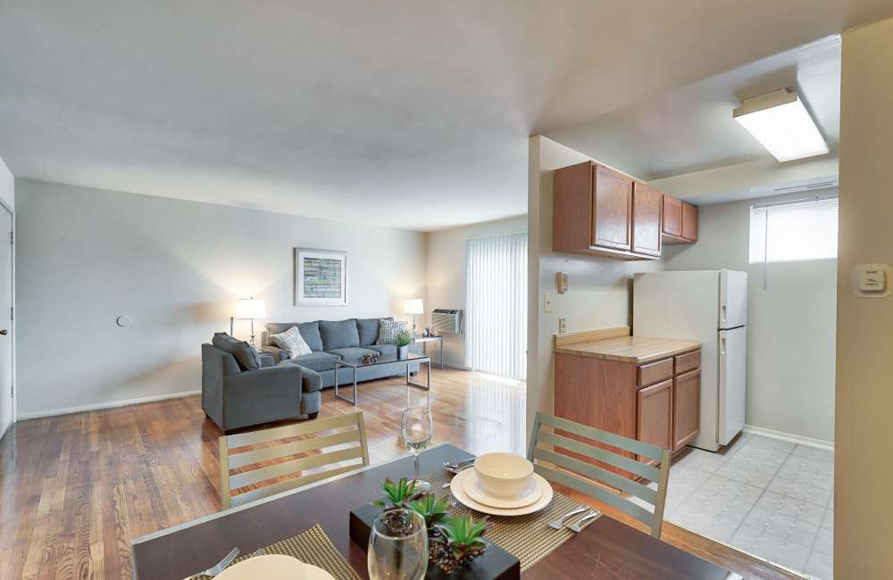 Living room with kitchen at Park Plaza in Baltimore, Maryland