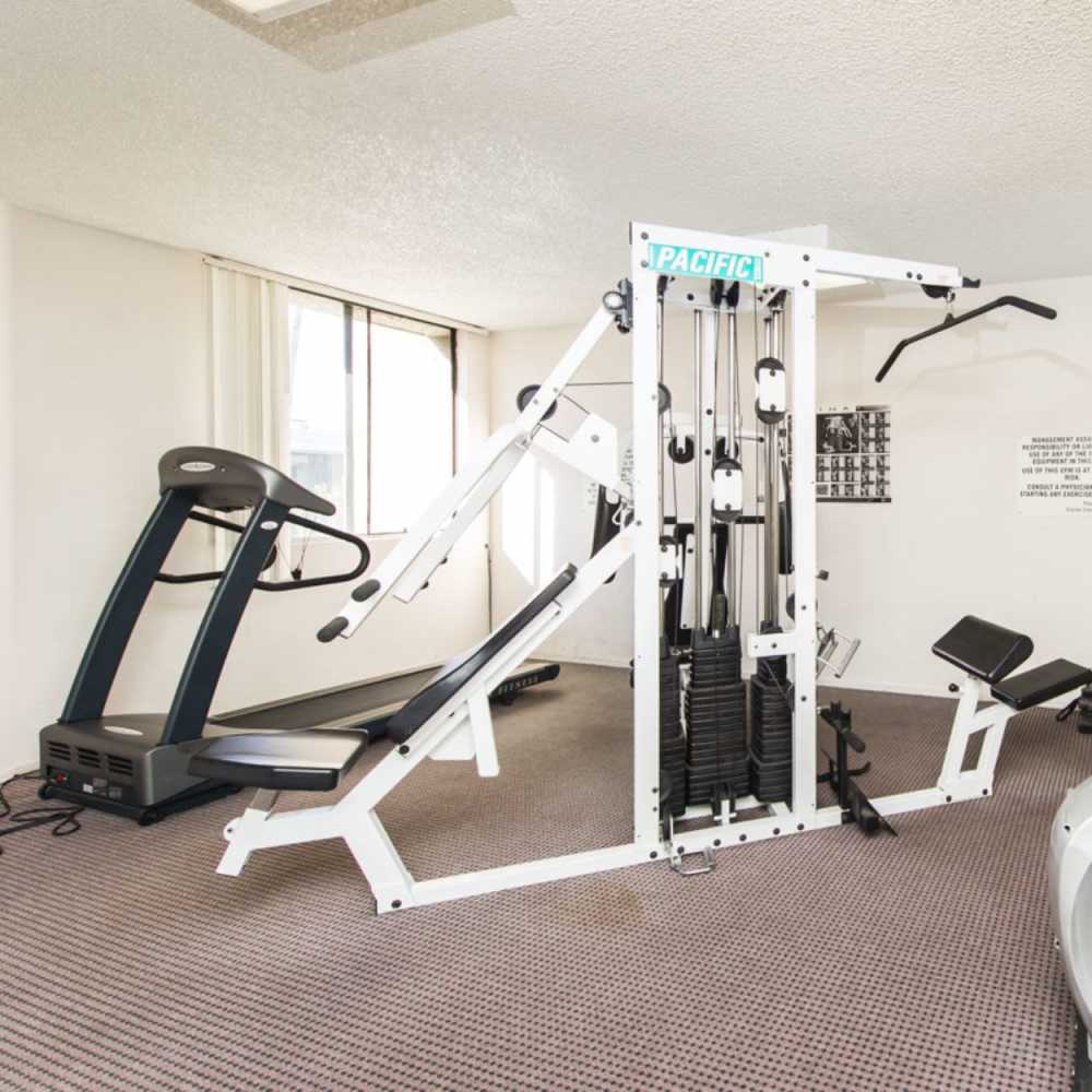 Fitness studio with treadmill at Encino Crest Apartments in Encino, California