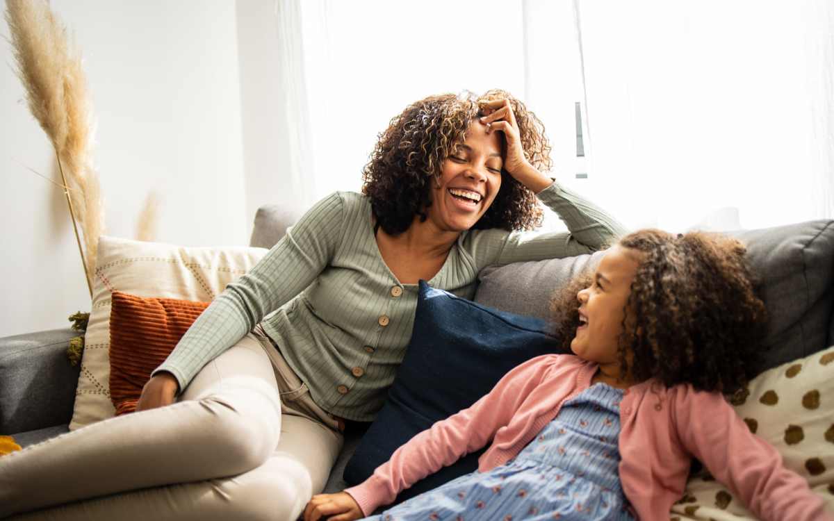 Happy resident with her daughter in the apartments at Landmark Apartments in Chesapeake, Virginia
