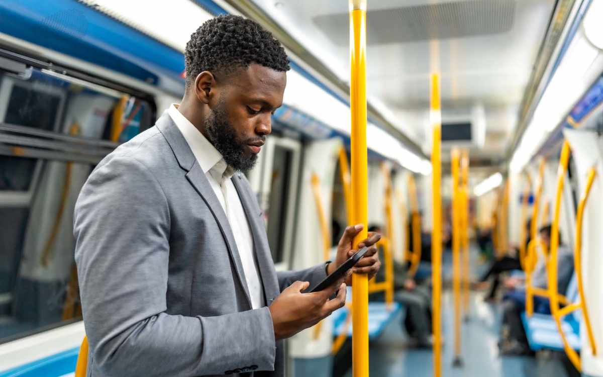 Resident in a metro using his mobile phone at Merton House in Bridgeport, Connecticut