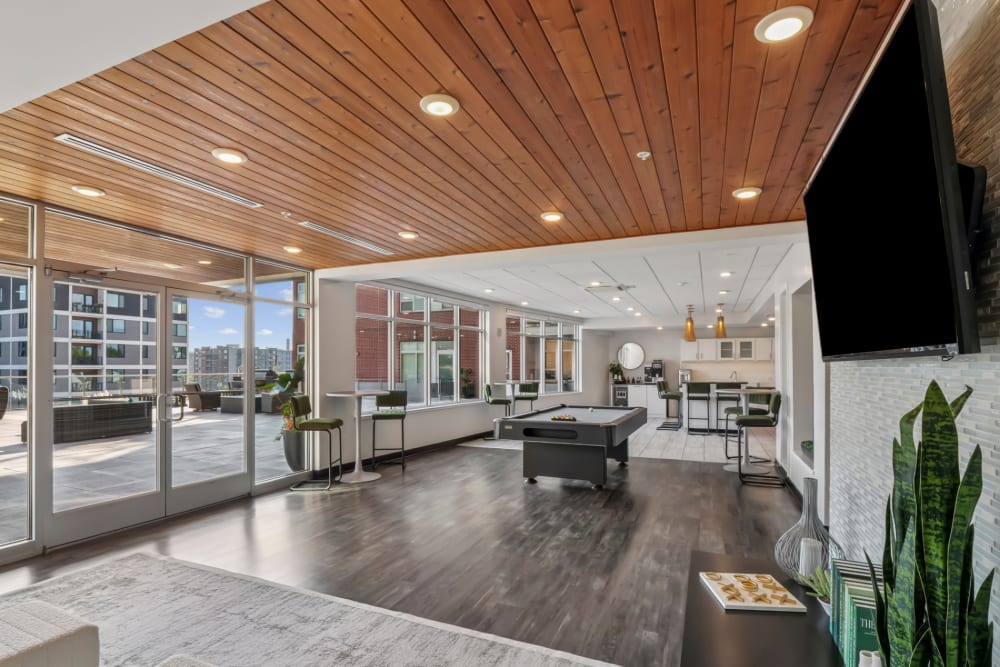 Community clubhouse with pool table at Terraces at Manchester in Richmond, Virginia