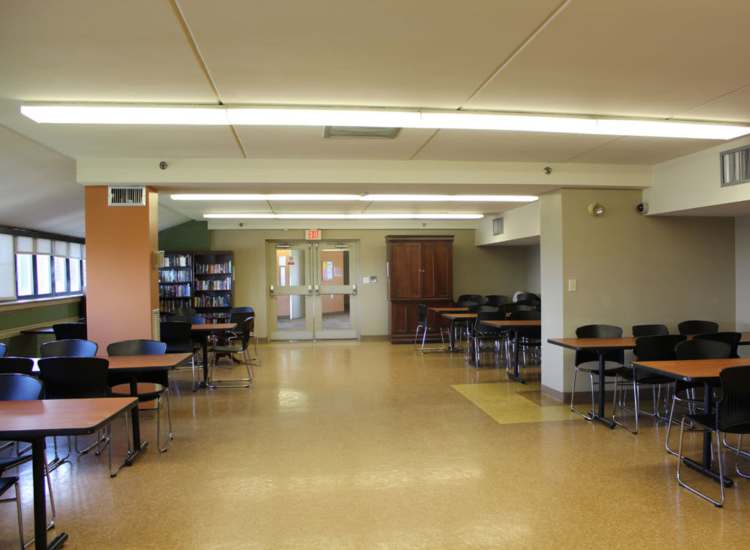 Vibrant community gathering space and a small library at Chelsea Village in Chelsea, Massachusetts