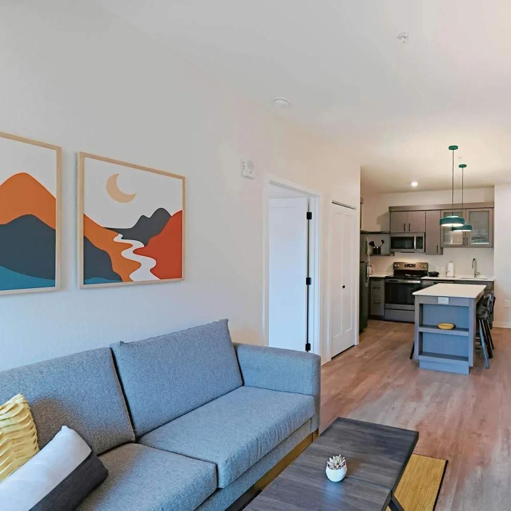 Modern living room with kitchen at WaterWalk Huntsville in Huntsville, Alabama