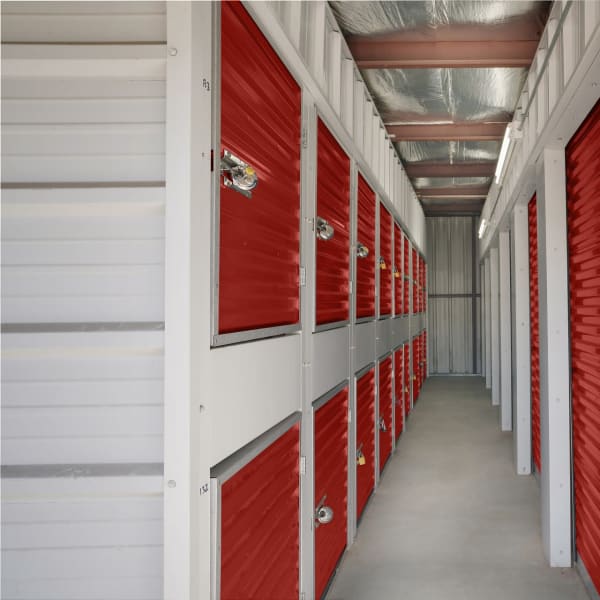 Red storage lockers at StorQuest Economy Self Storage in Champaign, Illinois