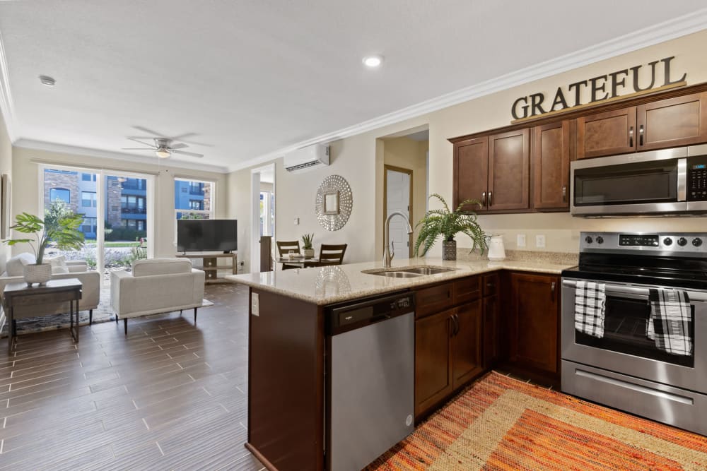 Modern kitchen and living space at Johnstown Plaza in Johnstown, Colorado