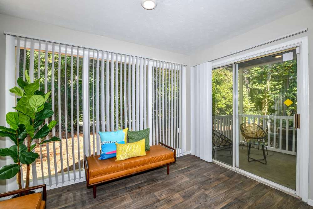 Sunroom with seating area at Preserve at Dunwoody in Dunwoody, Georgia