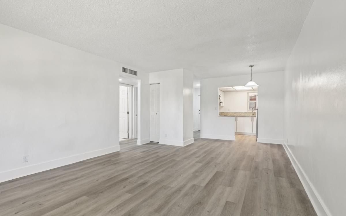 Spacious apartment living area at El Jardin Apartments in Hollywood, Florida