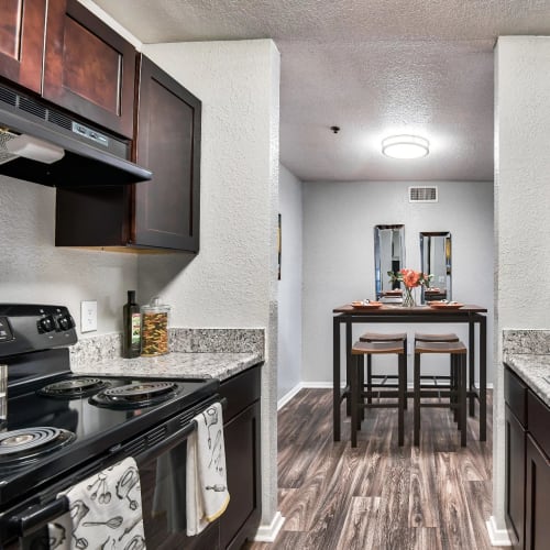 Black appliances in an apartment kitchen at Reserve at Stillwater in Durham, North Carolina