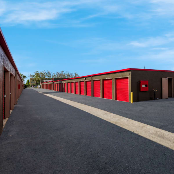 Outdoor drive-up storage units at StorQuest Self Storage in San Leandro, California