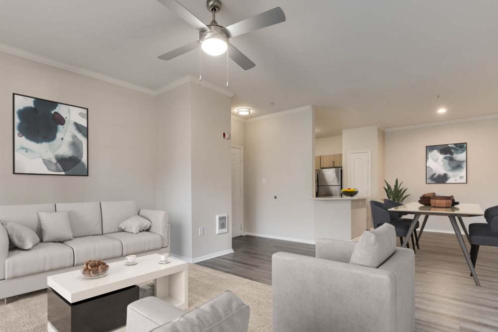 Well-furnished modern living area at The Grove at Orenco Station in Hillsboro, Oregon