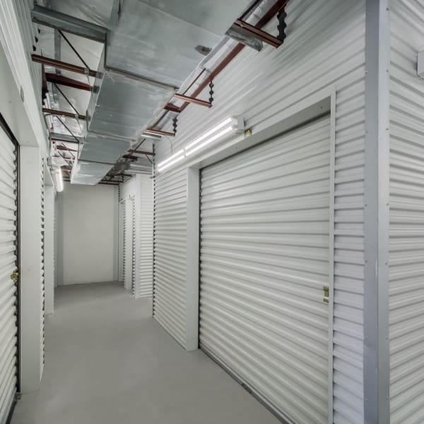 White doors on indoor units at StorQuest Economy Self Storage in Houston, Texas