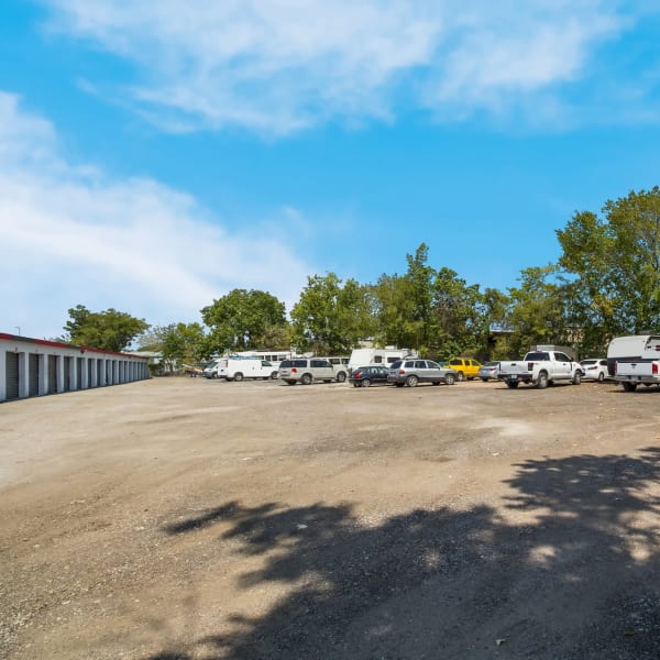 RVs and boats parked near storage units at StorQuest Economy Self Storage in Houston, Texas