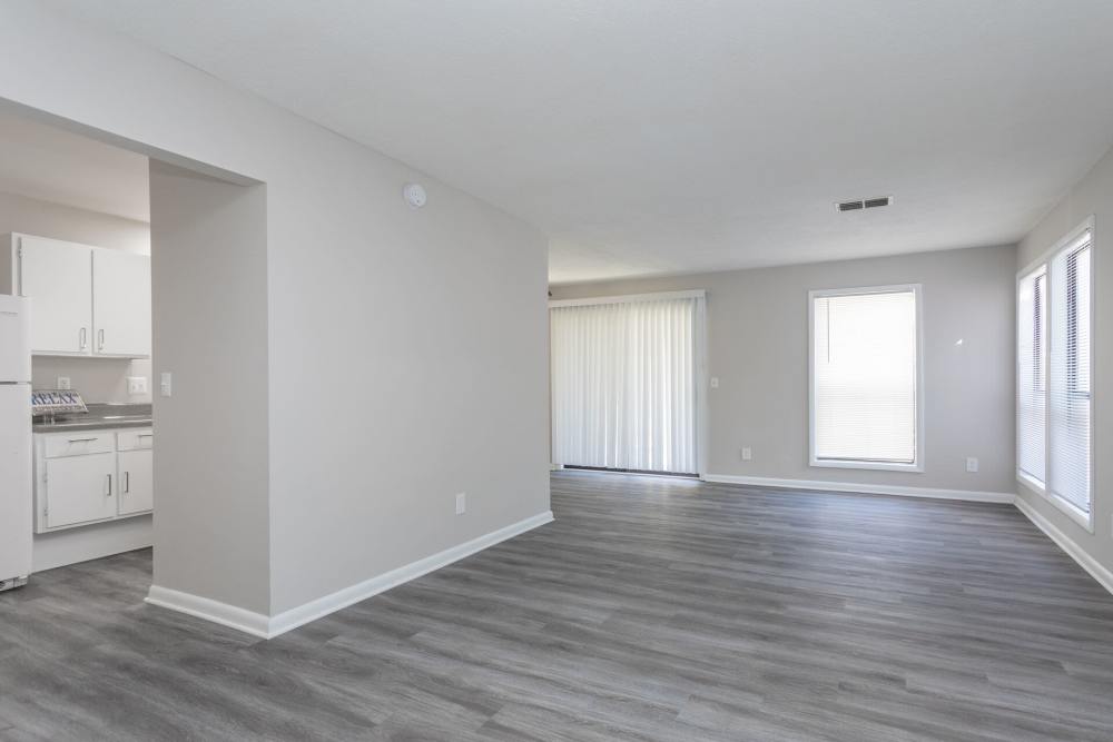 Unfurnished living room with windows at Landmark Flats in Fayetteville, North Carolina