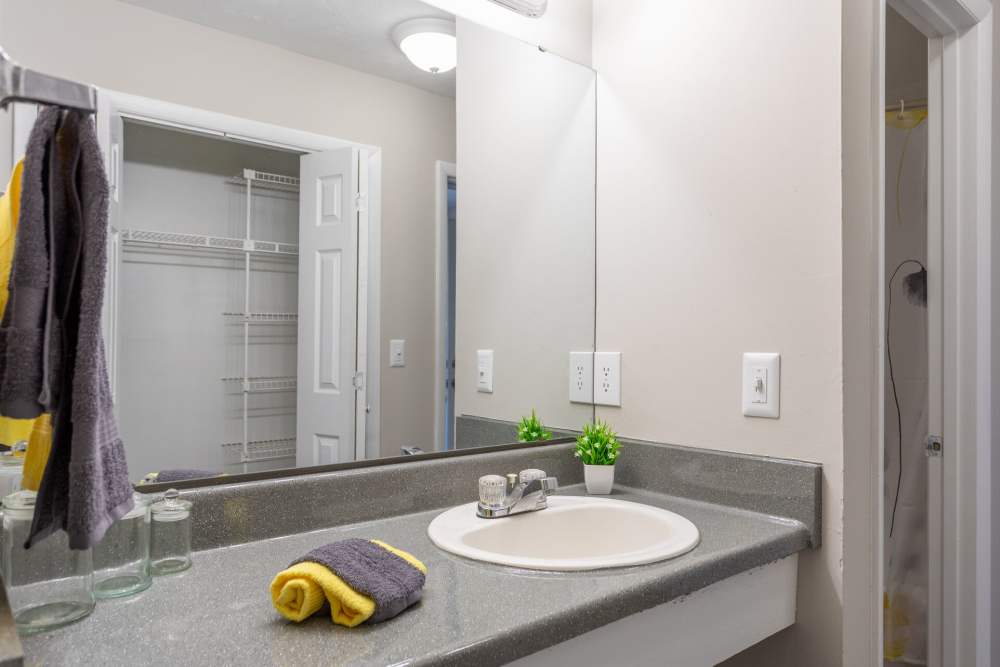 Bright bathroom with sink at Landmark Flats in Fayetteville, North Carolina