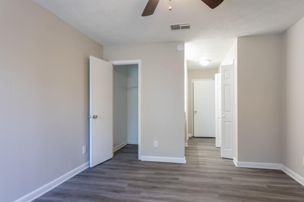 Bedroom with wood-style flooring at Landmark Flats in Fayetteville, North Carolina