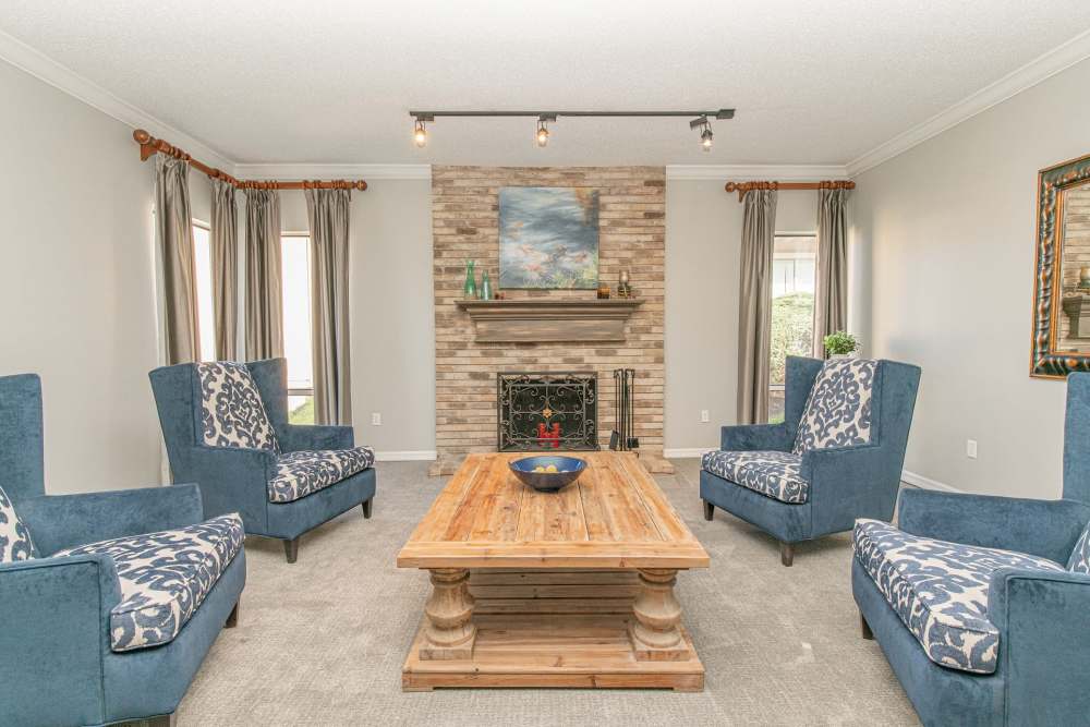 Clubhouse with seating area and fireplace at Waterford Manors in Manchester, Missouri