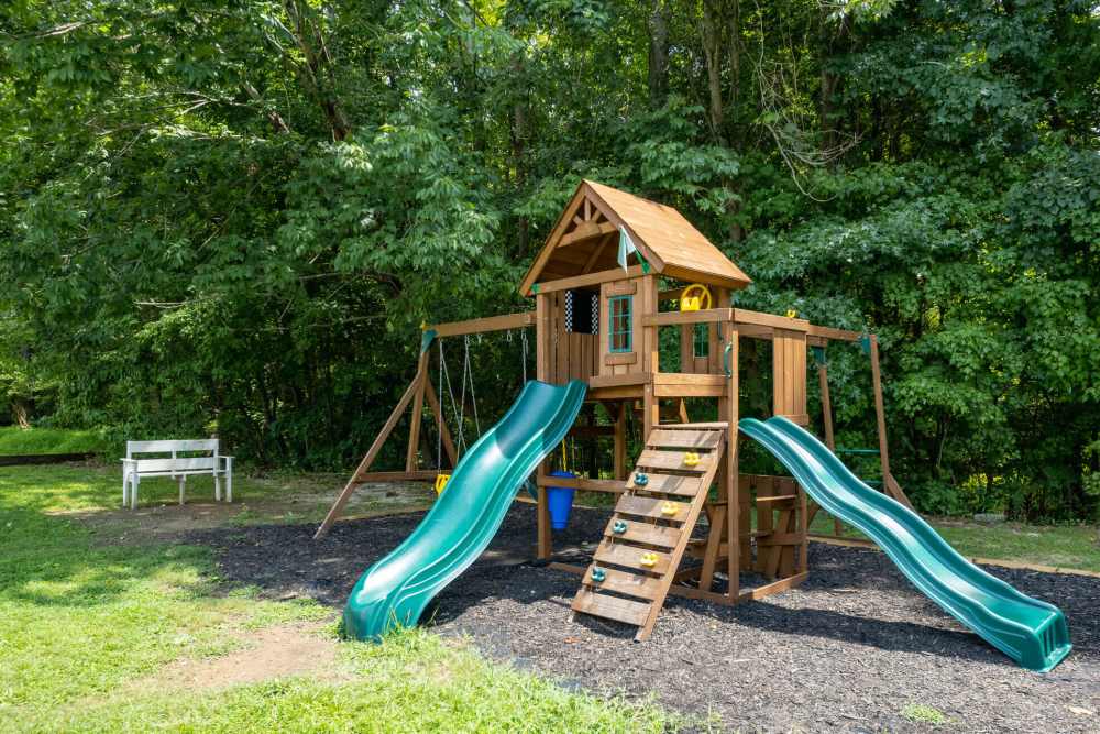 Community playground with slide at West Village Apartments in Hillsborough, North Carolina