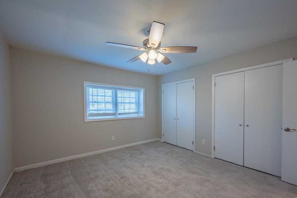 Unfurnished bedroom with window at Ivey Ridge Apartments in Graham, North Carolina