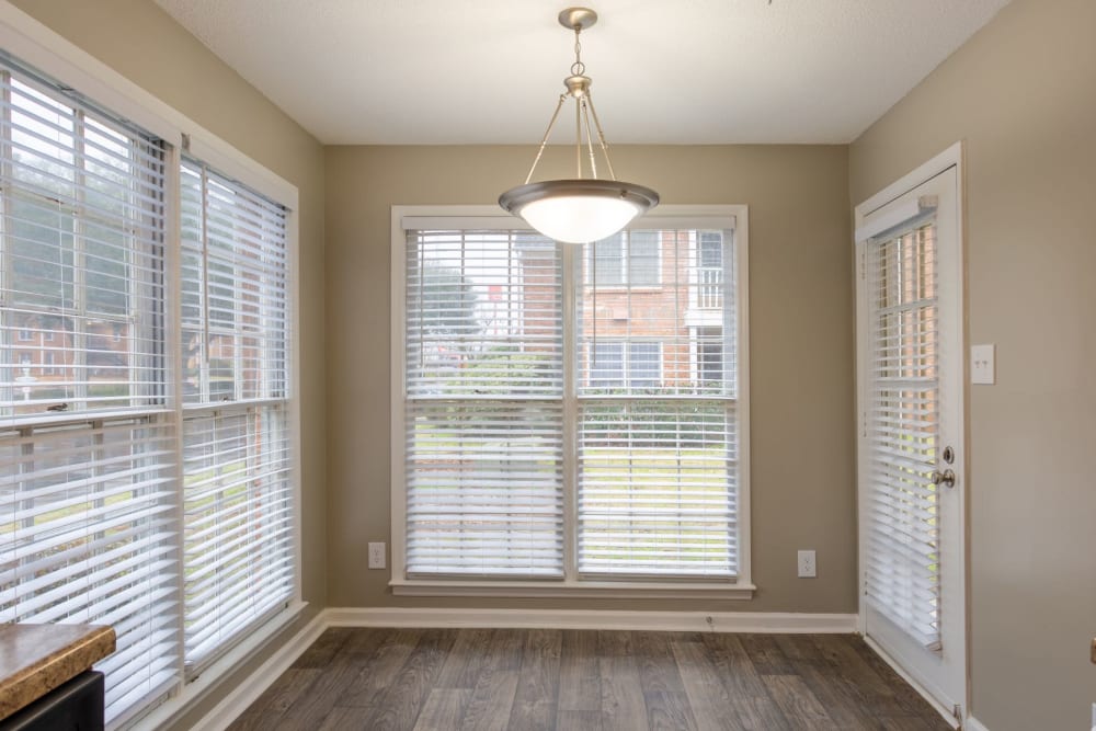 Dining room with great lighting at The Gatsby at Midtown Apartment Living in Montgomery, Alabama