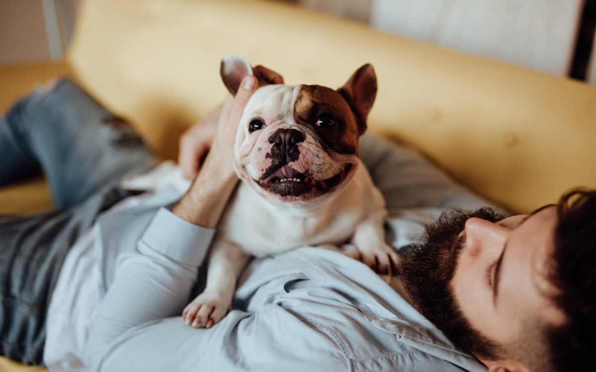 Resident with his pet dog at Franklin Manor Apartments in Saint Helens, Oregon
