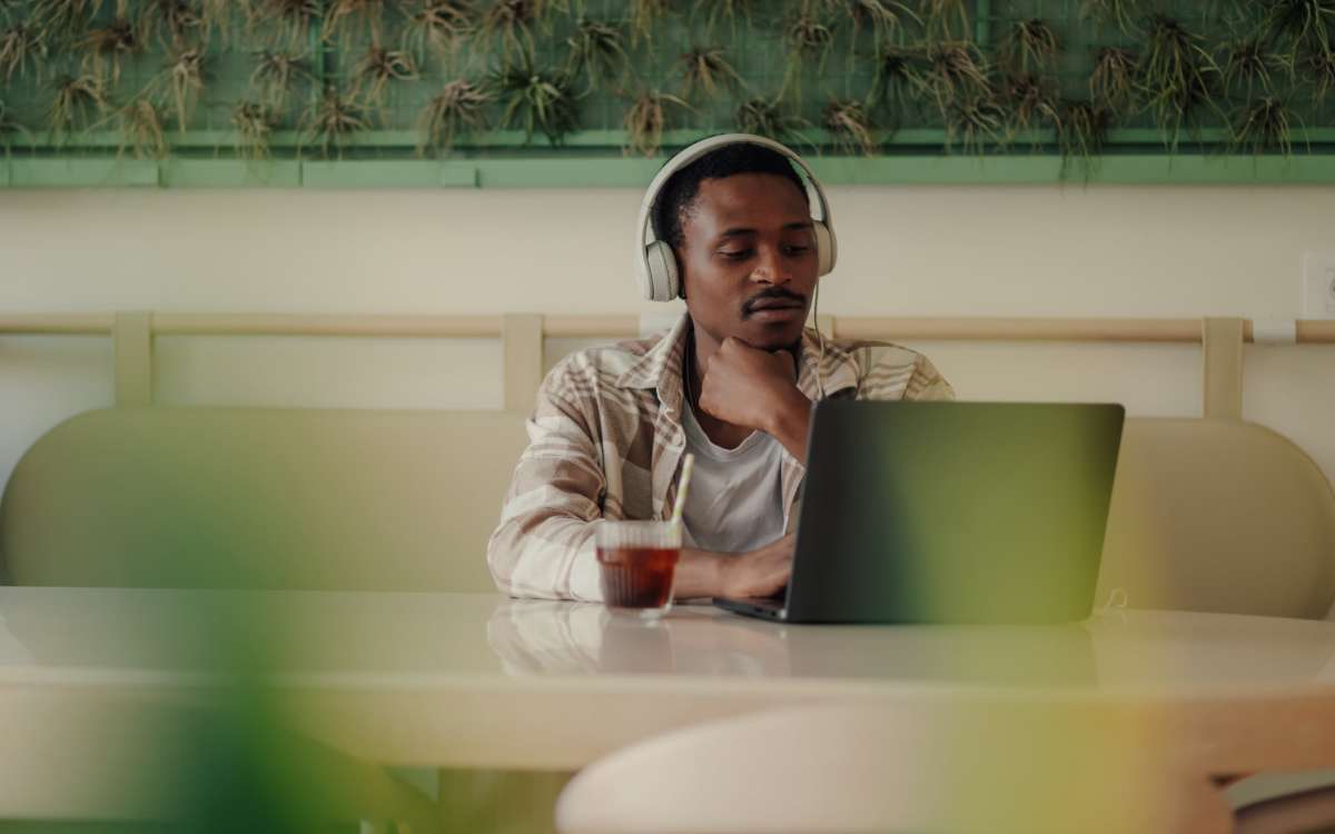 Resident working on their laptop at Stone Village Apartments in Reno, Nevada