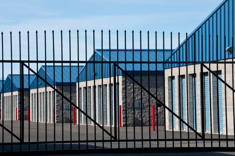 Fenced outdoor storage units at A-American Self Storage in Lancaster, California