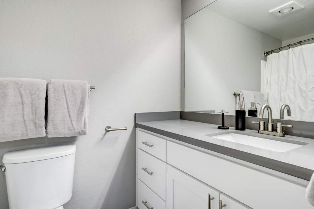 An restroom with modern style at Serramonte Ridge Apartment Homes in Daly City, California