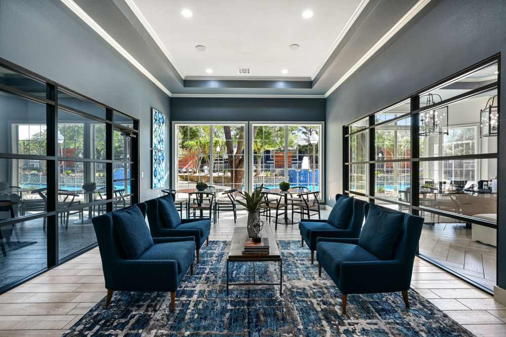 Community lounge area beside the pool at Seacrest in Katy, Texas