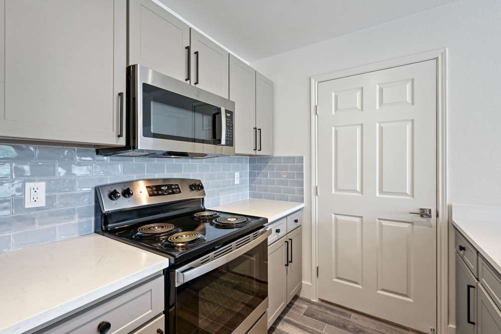 Kitchen with modern appliances at Seacrest in Katy, Texas