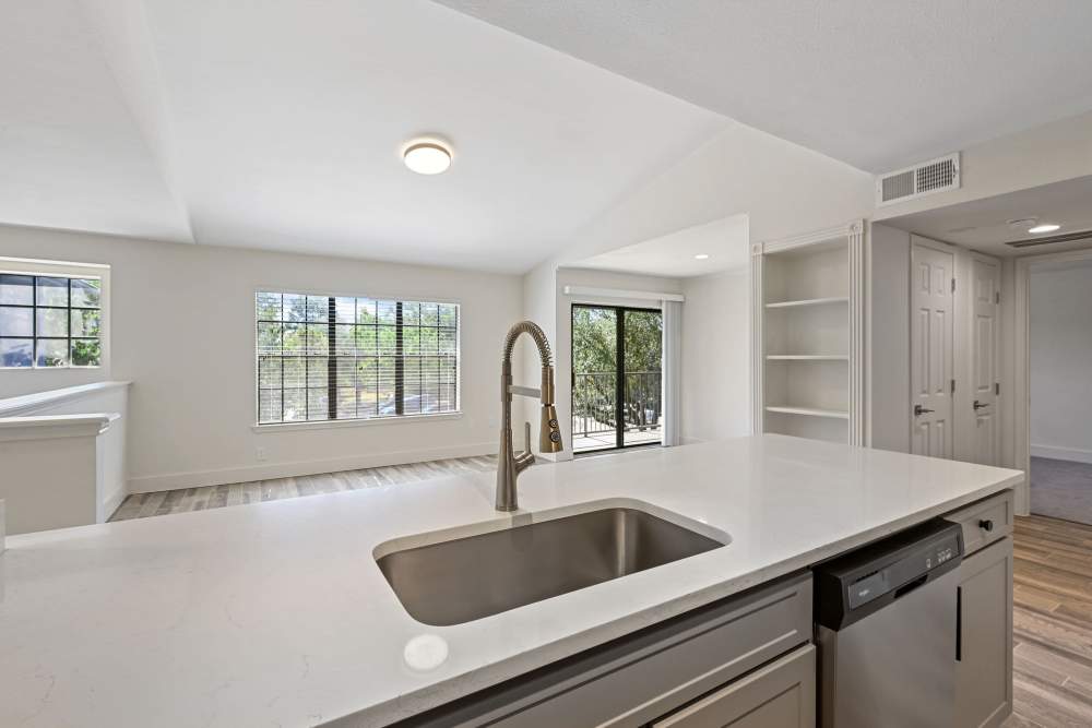 Unfurnished living room connecting to a kitchen at Seacrest in Katy, Texas