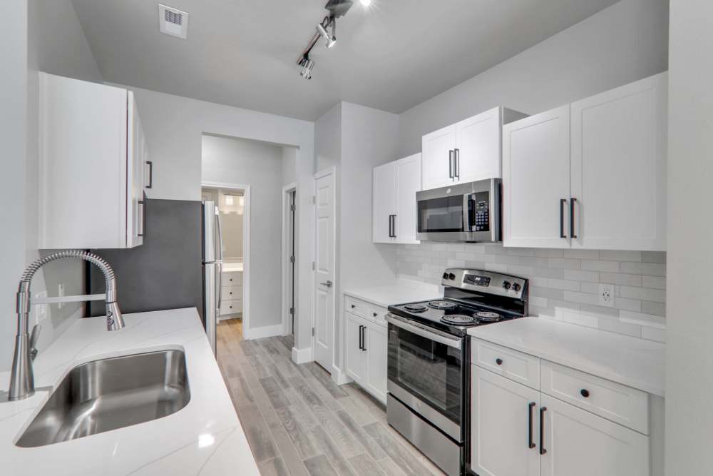 Kitchen with appliances and storage space at Wesley in Raleigh, North Carolina