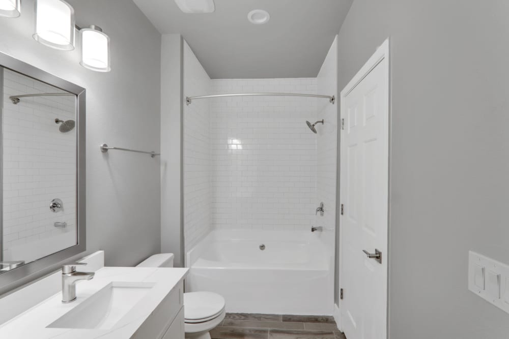 Bathroom with bathtub and sink at Wesley in Raleigh, North Carolina