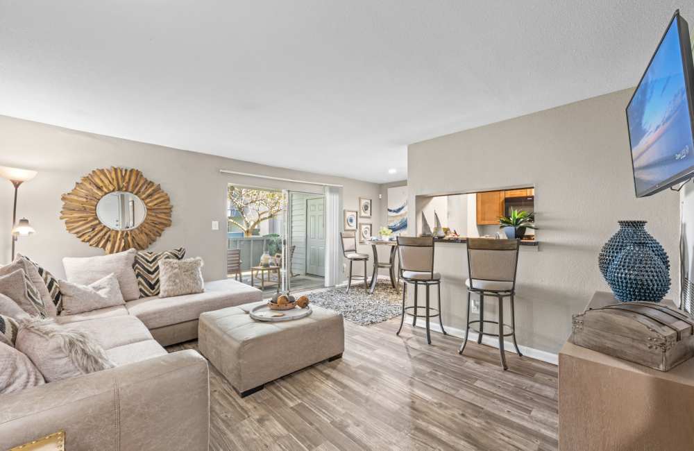 Living room with a couch and coffee table at Lakeside At Campeche in Galveston, Texas, 