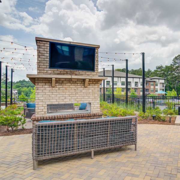 Outdoor fireplace at The Edison Sugarloaf in Lawrenceville, Georgia