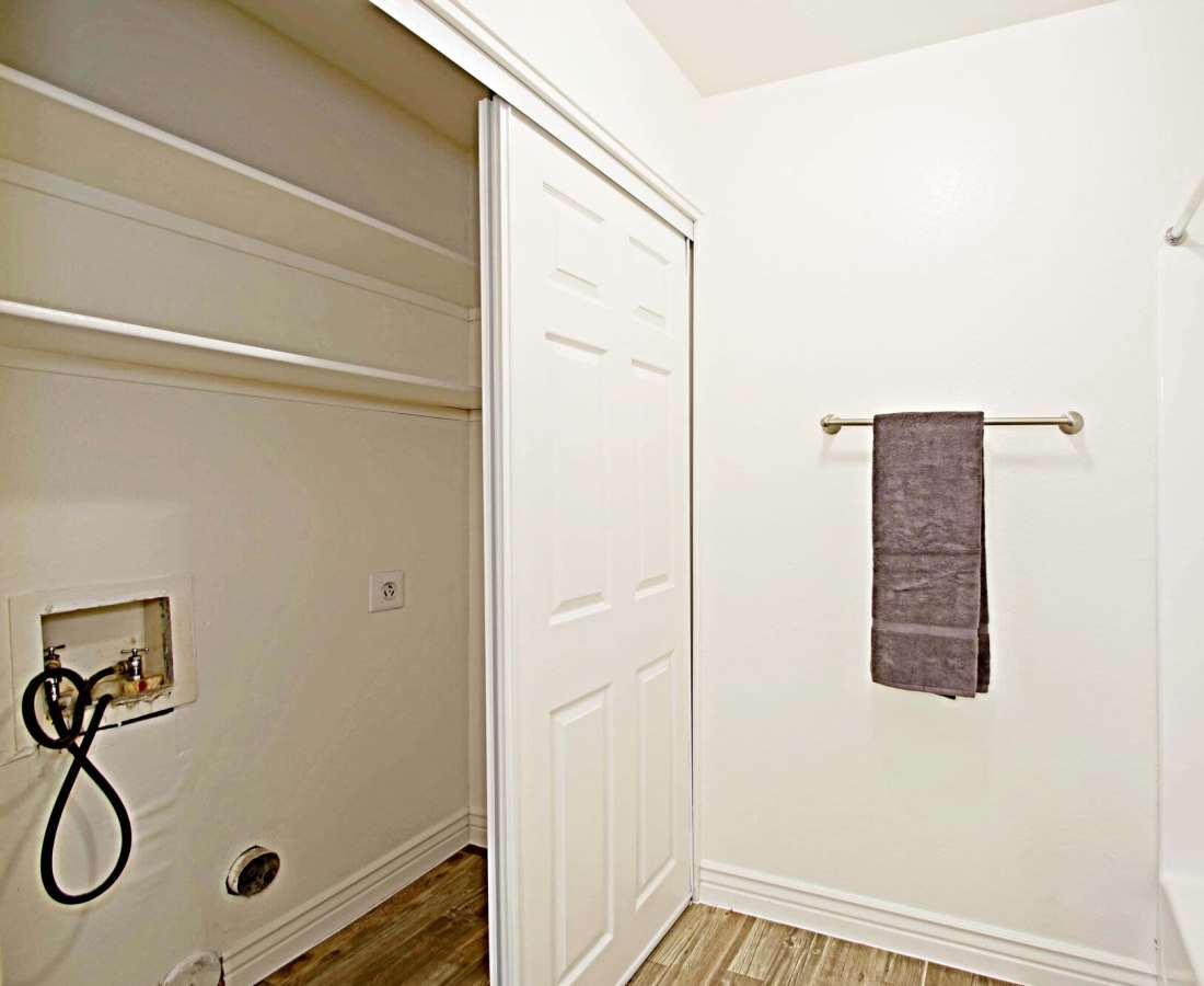Bathroom with storage room and towel at 544 Southern Apartments in Mesa, Arizona