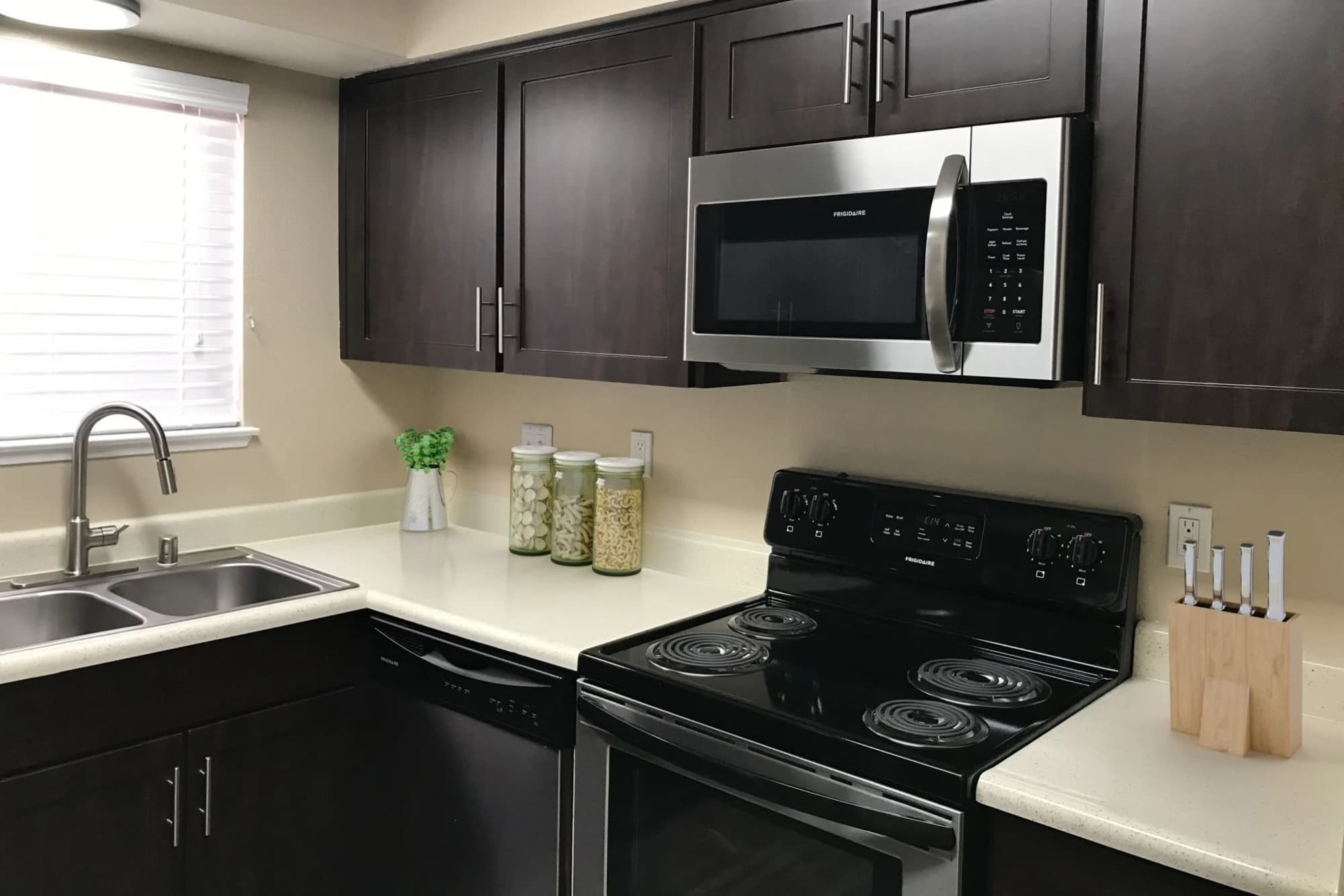 Kitchen with window at Bennington Apartments in Fairfield, California