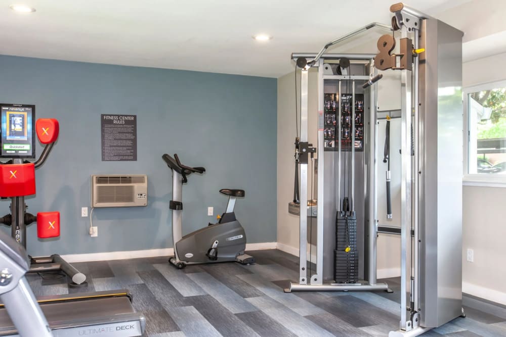 Fitness center with weight machine at Bennington Apartments in Fairfield, California