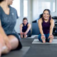 Resident doing yoga at Woodchase Apartments in San Leandro, California