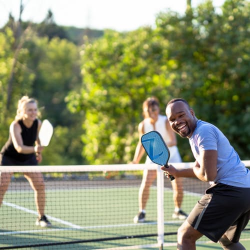 Residents playing pickleball at Alta Crossing in Marysville, Washington