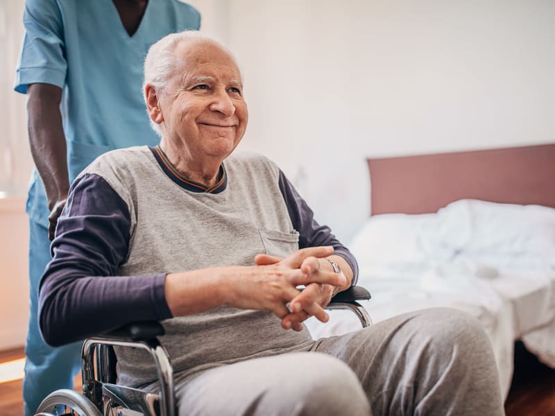 Resident and caregiver on their way to therapy at Transitions At Home in Elkhorn, Wisconsin